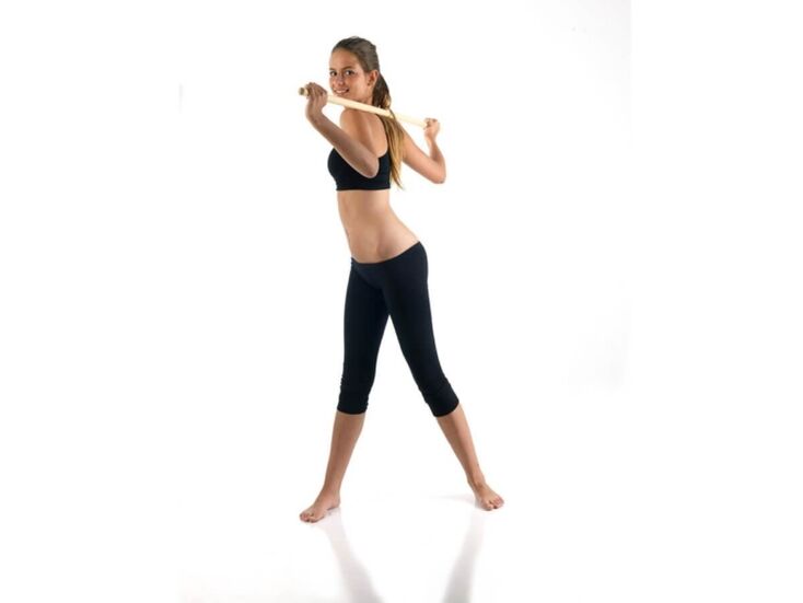 Exercise with a stick to strengthen and develop the muscles of the back with thoracic osteochondrosis